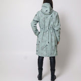 Sieviešu softshell mētelis – Palmas Mix uz gaiši zaļa fona